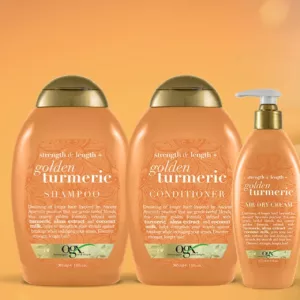 شامپو زردچوبه طلایی اوجی ایکس با عصاره شیر تغذیه کننده موها تحریک کننده رشد موها OGX Strength Length + Golden Turmeric Shampoo